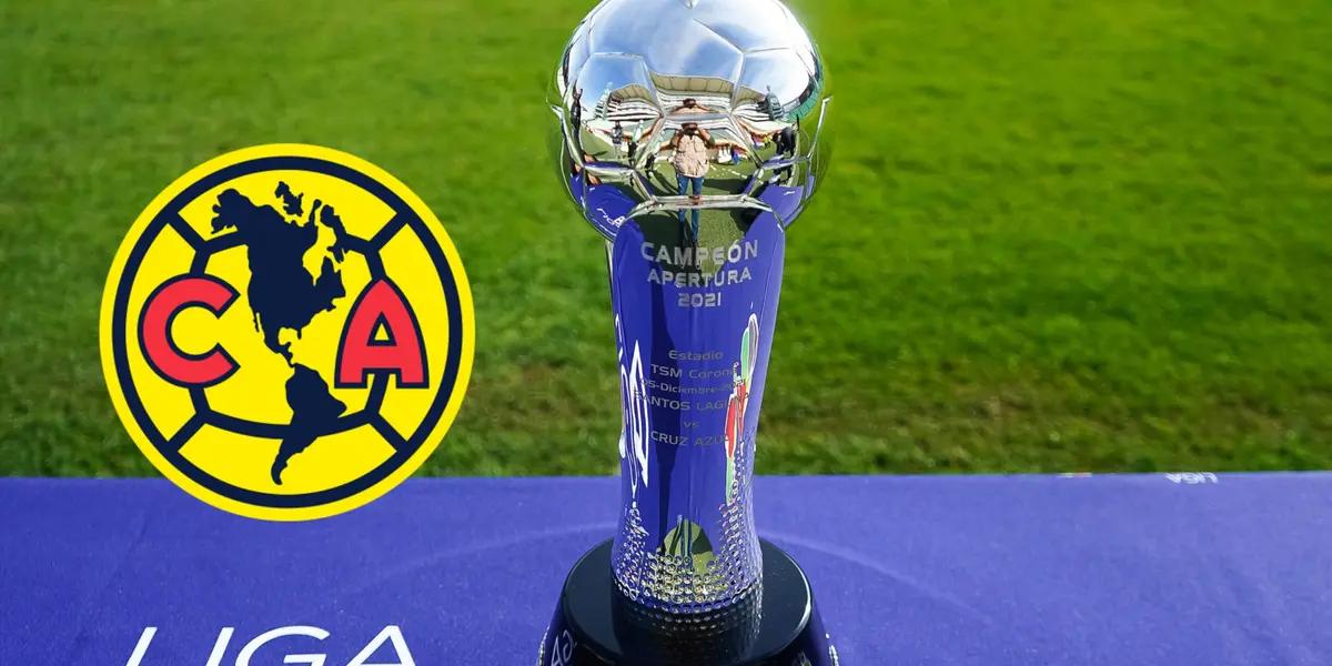 Trofeo de la Liga MX y escudo del América